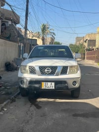 نيسان نيـفارا موديل 2013  فئة LE اعلى فورويل  كير عادي كاز  رقم بغداد ...