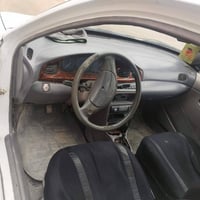 كيا افيلا • ١٩٩٦ • تبريد ثلج