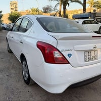 نيسان سني هندي 2019 رقم بغداد بسمي مكفوله من الضربه والصبغ والبارد ماش...