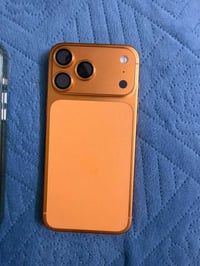 ايفون 17برو ماكس برتقالي شريحه اكترونيه ذاكرة 256 برطاريه 100 مشحون 14...