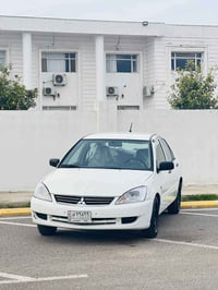 لانسر • ٢٠٠٩ • ميكانيك شرط