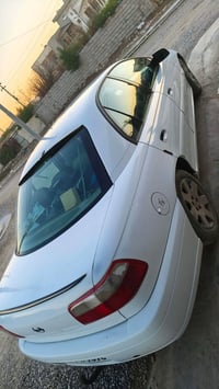 ٢٠٠١ • ٣٢٠٠ • جير عادي