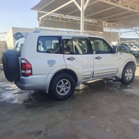 سياره للبيع او مراوس باجيرو موديل 2001 السيارة مكينة وكير بلاد وحدادية...