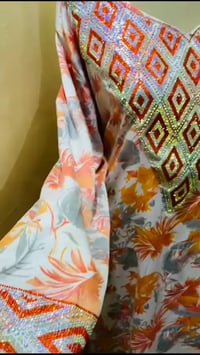 مخاور • ملابس