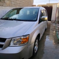 للبيع  دوج كراند كرفان  2008 مكينه 6  3600 رقم بغداد انكليزي بأسمي  كش...