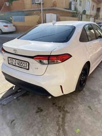 تويوتا كورولا ٢٠٢٣ LE امريكي لون ابيض  ضرر بوند صبغ فقط بدون دواخل وبد...