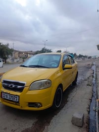 افيو 2009مكينه كير شرط هيئه وغرامات صفر  كوبون بانزين ورقي سياره جاهزه...