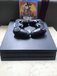 بلاي4 برو 1تيرا • ملحقات كاملة • ريد ديد2