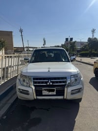 باجيرو 2014 اللوان صدفي رقم واسط فول خليجي  ماشية 226 الف كشنات جلد كه...