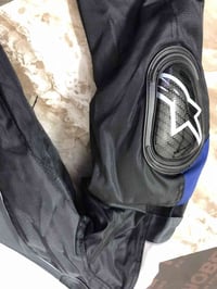 بدلة دراجات • حماية • توصيل بغداد