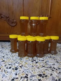 عسل طبيعي • ١٠٠٪ • بدون سكر