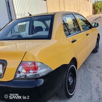 ياالله لانسر موديل 2014 الوحيده بل عراق خليجي بيه طخه خفيفه بصندوك بدو...