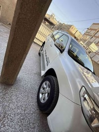 برادو ٢٠١٥ رقم بغداد فئة TXL دبل تانكي ماشية ١٥٥ الف  مكفولة بدون حادث...