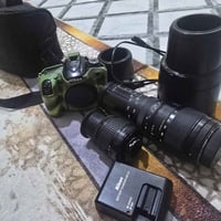 كاميرا للبيع نيكون 7100 دي مع كامل ملحقات حزام ضهر  بطارية + شاحنة  زو...