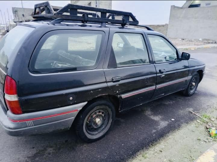 سلام عليكم فورد استيشن ايسكورت موديل ٩٢ سياره حلوه ونضيفه ما بيها مصرف  تحويل تريد او وكاله حاضر كير محرك مكفول محرك مال كصة شديتة 600دولار ٤سلندر مابيها صرف ولا بخار سنوية بسمي مابيها صبغ بس البونيد اثر  تخم تاير جديد طك   جراد غير متواجد على نت لل استفسار اتصل ***********
