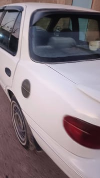 سيفيا ١٩٩٤ • أبيض • رقم بغداد