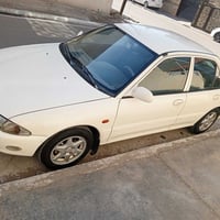 للبيع بروتون ويرا 2005 لون ابيض رقم بغداد بأسمي نظيفه جدآ بلاديه بدون ...