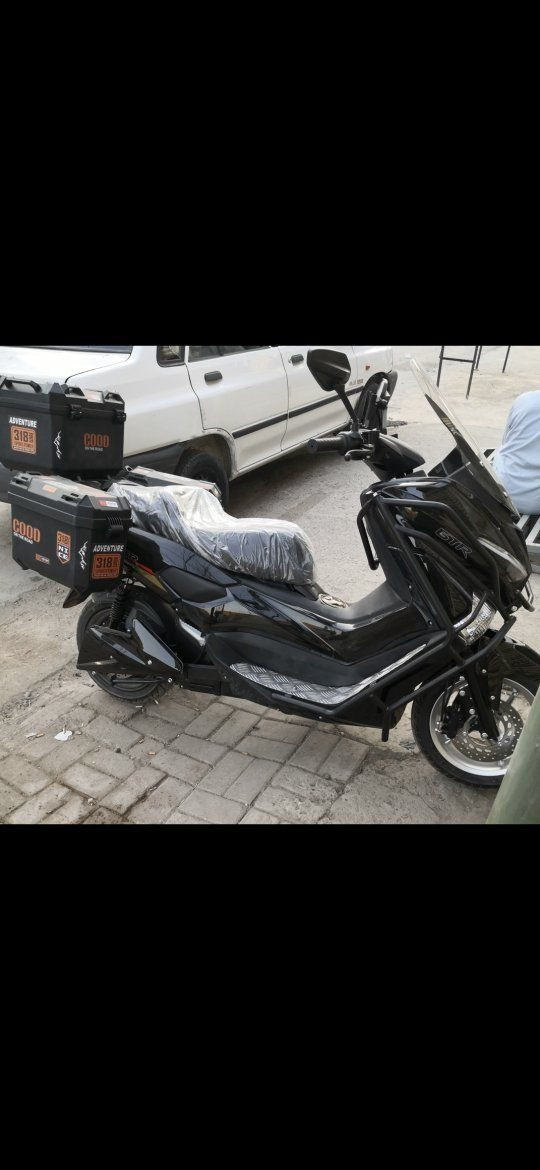 دراجة شحن nmax  ملف 2500 واط من شركة shinwin افضل شركة محركات صينية بطارية ليثيوم 72فولت السرعة 95كم الشحنة الواحدة تمشيك 90كم دراجة تحفة بمعنى الكلمة السعر 1,800مليون وثمنمية بغداد ***********
