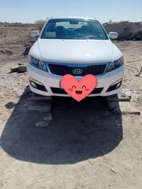 اوبتيما • ٢٠٠٩ • جلد بصمه