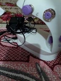 مكينة خياطة • يدوية