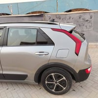 سيارة كيا نيرو وارد امريكي 2023 نص مواصفات الضرر جاملغ  امامي دحج بدون...