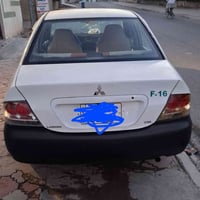 لانسر ٢٠٠٦ • يحتاج صبغ • حزام مكينة جديد
