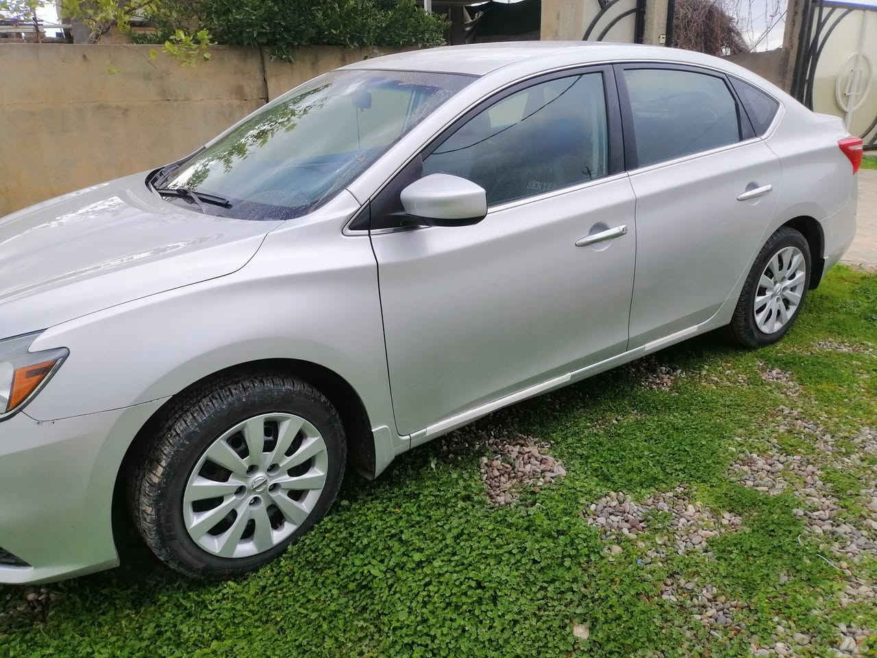 نیسان سینترا 2017 رقم نينوي باسمي شرط التحويل حادث السيارة جاملغ امامي سكن فقط بارشود استيرن والدشبول والسعر ١١٣ رقم التلفون ***********
