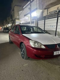 لانسر 2008 سياره ب اسمي. مكفوله من ضربه بس جاملغ الخلفي بي ضربه صفحه و...