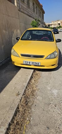 للبيع.  كيا ريو موديل  2001 بأسمي  كير محرك  مازدا  حجم 323 محرك بي رخ...