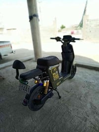 دراجة شحن ار 9 • بطاريات ٣٢ أمبير • ملف ١٥٠٠ واط