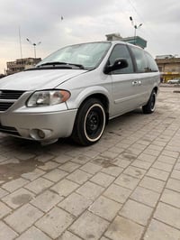 من رخصة مدير الاكروب  للبيع دوج كرفان رقم بغداد ألماني  موديل 2005 سنو...