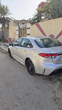 للبيع كورلا رصاصي موديل 2023 LE مكينه 2000 رقم بغداد جديد تحويل ثاني ي...