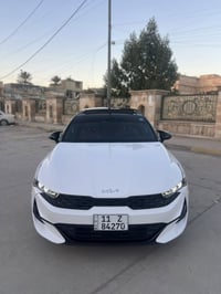 K5 gt line 2024 وارد امريكي لون ابيض  العداد 32 الف كيلو  محرك 1.6 تير...