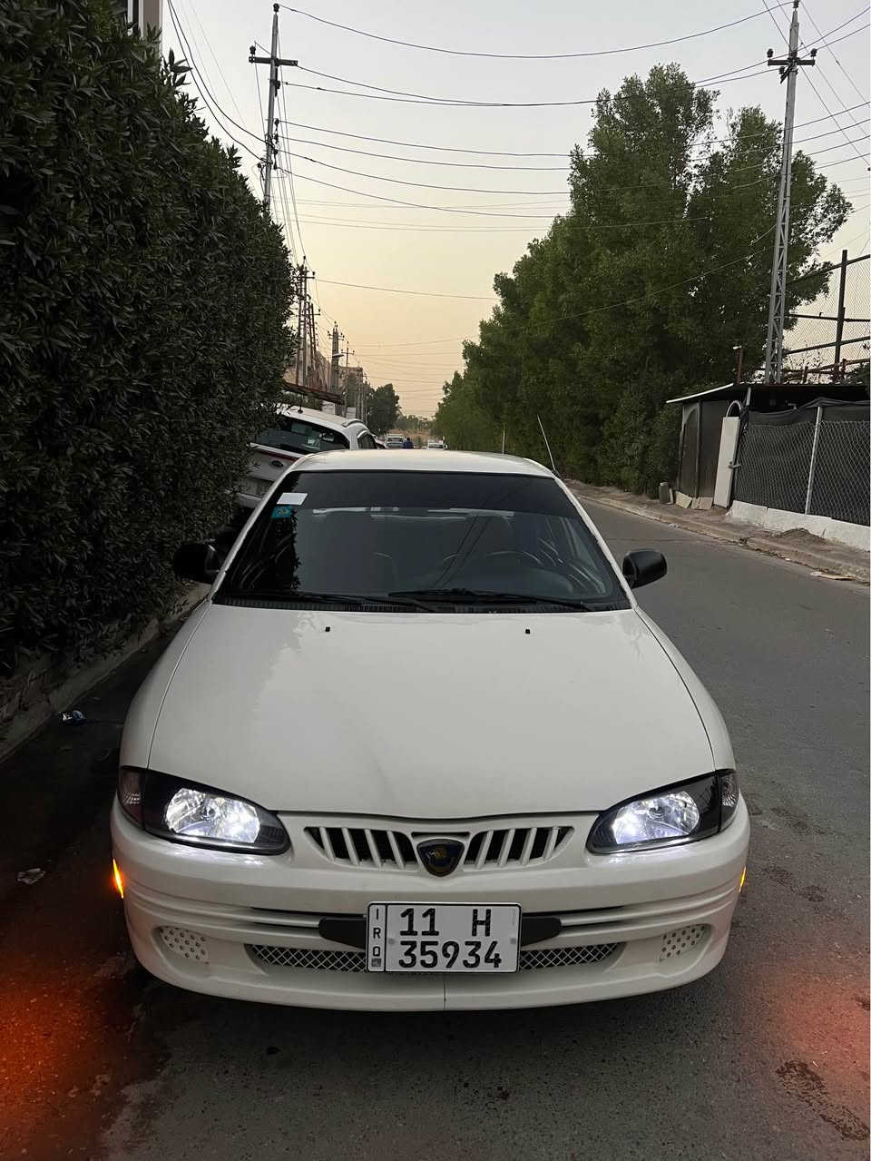 بروتون 2004 ويرا رقم بغداد بااسمي كير اوتو بدون حادث مصبوغه جماليه  عليه اضافات وترتيب كلش حلو سقف كنتاره وضايفله اناره روزرايز كشنات مدوشمهن جلد ارضيه جلد الداخل مغير لونه اسود وحمر ضايفله بجم سبورت وبك لايت لد عليها سستم صوت بايونير كزوز رياضي بوابات وكزوزه القديم موجود لايت زنون كهربائيات بالكارتون ماناقصهن كلشي وشرط واير جطل مابيه باتري جديد تايرات جدد اذاين محرك جدد  مكينه كير بالكارتون تبريد ثلج تدفئه شغاله سياره جاهزه من كلشي رقم بغداد بااسمي هزه جديده وسنويه قبل سبوع جددته لل31 وارقام جدد بيع فقط عارضه 55 وبيه مجال بسيط *********** مكاني بغداد حي الجهاد بغداد, العراق
