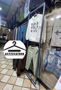 ستاندات حديد • تركيب رفوف • ديكورات محلات