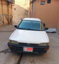 كورلا ستيشن • ابيض • الموصل الايمن