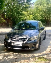 corolla 2009 بیکاشۆ مەکینە گەورەی گێر عادی  سێ پارچە بۆیاغ  سیستمی غاز...