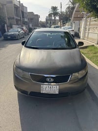 كيا فورتي موديل 2012 رقم بغداد سنوية ساقطة  ماشية 145 الف  وارد امريكي...