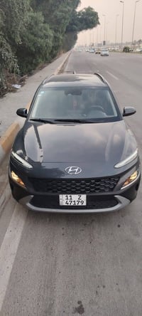 هونداي كونا 2023  مرقم بغداد   وصور الحادث مرفقة والسونار بجم كبس شاصي...