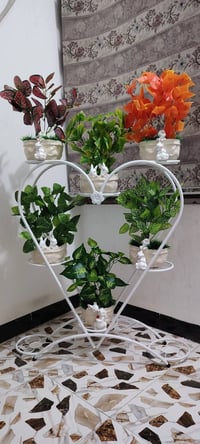 أشجار وسنادين ورد بأشكال جميله وقياسات مختلفه جمله ومفرد للطلب راسل ال...