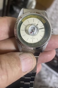 ساعة دليل المسلم • بوصلة القبلة • حركة سويسرية