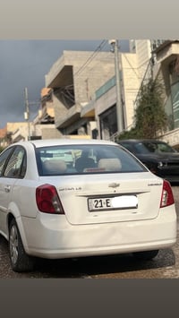 عربي سلام عليكم اوبترا موديل ٢٠١٢  سونر موجود مع صورة سيارة مو حزام بل...