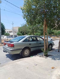 مازدا 91علوج 8کارێتەر کارەبای کامل جائیزە نرخی 12وەرەقە07501421920
