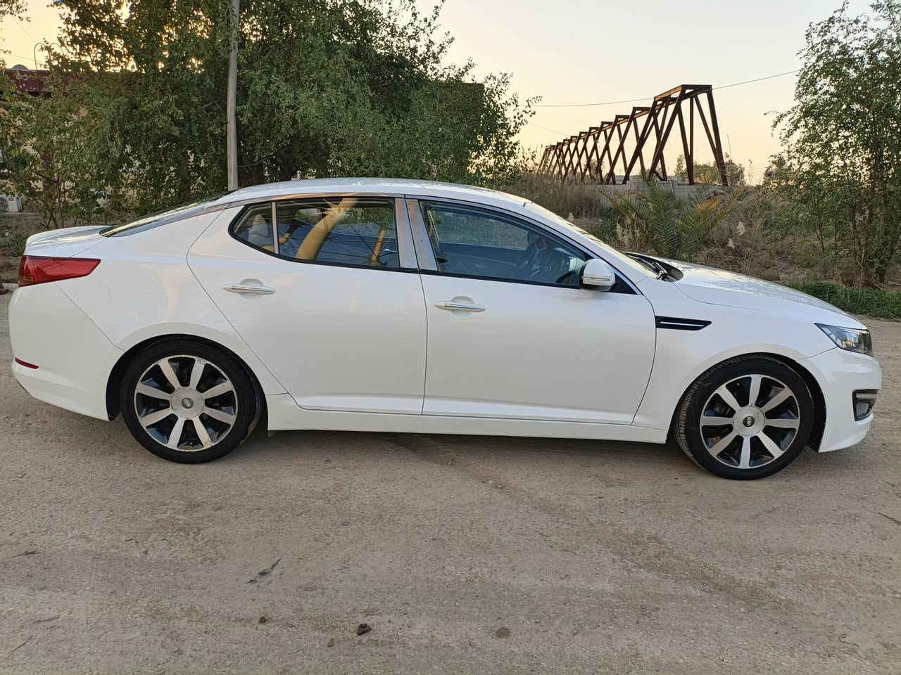 اوبتما 2012 خليجي مكفولة من الصبغ والتبديل فقط باردات زغار ما مبينات مكينة 2000 دوش ما مفتوحة  مكينة وكير بلاديات تبريد ثلج ترايك شرط 200 اقتصادية ونشطة سيارة جاهزة وكلش حلوة بالحقيقة ماشية 177 مدوشمة جلد ارضية وكشنات ما ناقصة برغي مكانهة بالديوانية المركز *********** سعرة ب 122 بيه مجال 
لد نهاري امامي
تحكم ستيرن اربع جهات
شفتات ستيرن
نضام ايكو تقليل صرف الوقود
كروز مثبت سرعة
مري شفط 
اشاير بالمري 
يدات نيكل داخل و خارج
ويل كب 18 رياضي بلادي 
تبريد قطعتين
ثلاجة بالجكمجة 
لاقطة تليفون 
لايت أوتو
حساس خلفي
دخل مطعم صاج 
داخل بيجي 
شاشة اعطال 
شاشة تبريد بيانو 
منفذ اواكس و USB
