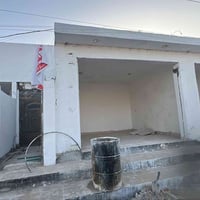 اعلان  للإيجار مشتملان سكنيان مع محلين تجاريين متوفران للإيجار في موقع...