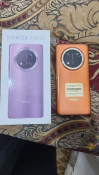 هونر X9c • برتقالي • زجاج الكاميرا الخلفية مكسور