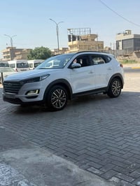 توسان 2019  رقم بغداد  ماشيه 55 الف حقيقي وقابل للزياده  فول مواصفات ل...