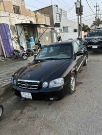 أوبتيما ٢٤٠٠ • ٢٠٠٦ • ديونيه