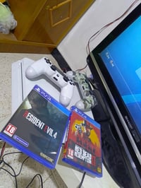 بلايستيشن 4 أبيض • جويستك أصلي • RDR2+RE4