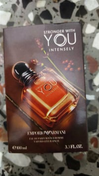 عطر بالكارتون • مستخدم قليل • ريحة عود خفيف